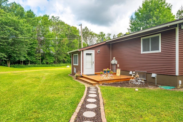 36977 Shoreland Rd, Sturgeon Lake, MN 55783 - view of green lawn featuring a wooden deck