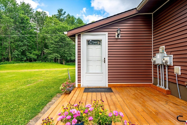 36977 Shoreland Rd, Sturgeon Lake, MN 55783 - property entrance with a lawn and a deck