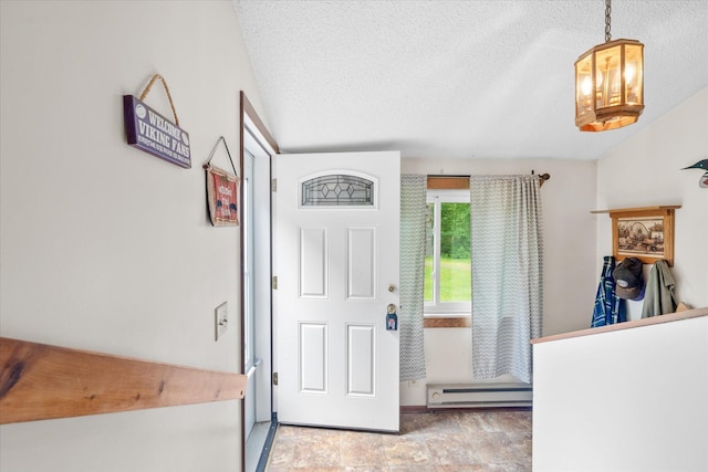 36977 Shoreland Rd, Sturgeon Lake, MN 55783 - foyer with baseboard heating, a textured ceiling, and a chandelier