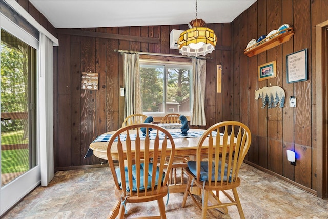 36977 Shoreland Rd, Sturgeon Lake, MN 55783 - dining area featuring wooden walls and stone finish floors
