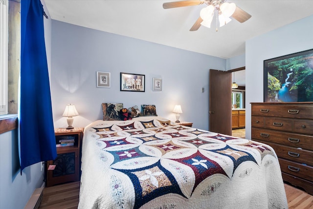 36977 Shoreland Rd, Sturgeon Lake, MN 55783 - bedroom with light wood-style floors and a ceiling fan