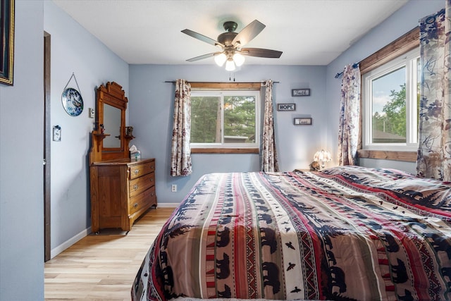 36977 Shoreland Rd, Sturgeon Lake, MN 55783 - bedroom with light wood-type flooring and ceiling fan