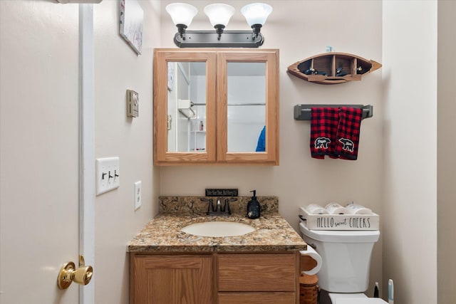36977 Shoreland Rd, Sturgeon Lake, MN 55783 - bathroom featuring vanity and toilet