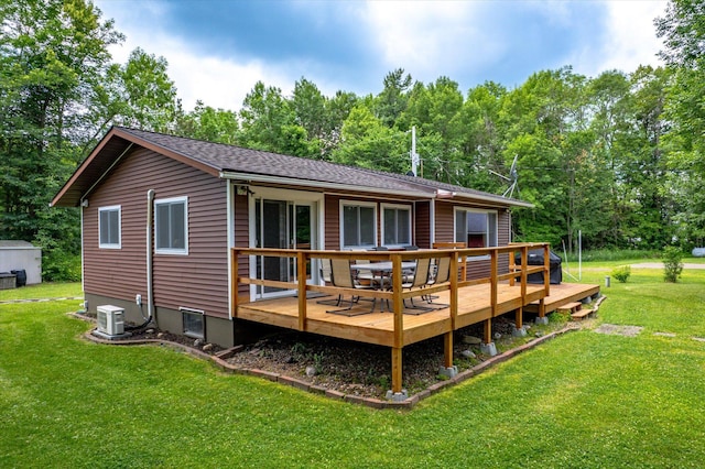 36977 Shoreland Rd, Sturgeon Lake, MN 55783 - rear view of house with a yard and a deck