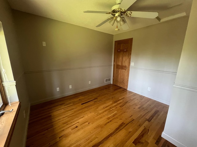 13205 Lake Place Rd, Baldwin Twp, MN 55398 - empty room featuring wood finished floors and a ceiling fan