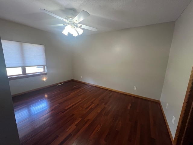 13205 Lake Place Rd, Baldwin Twp, MN 55398 - unfurnished room with dark wood finished floors and ceiling fan