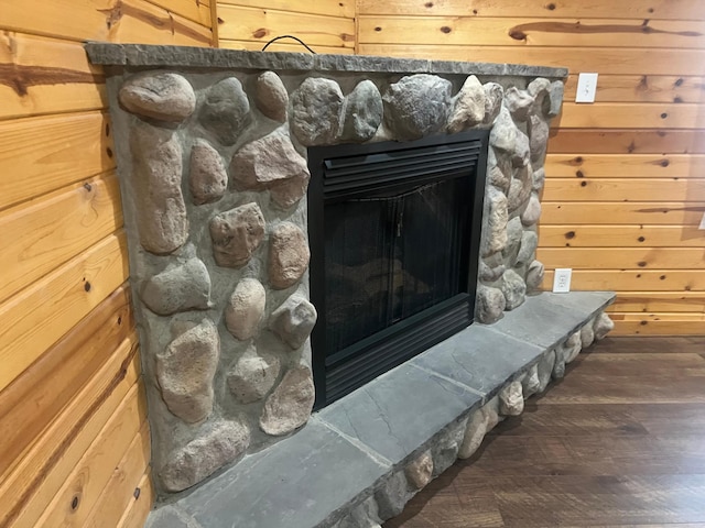 13205 Lake Place Rd, Baldwin Twp, MN 55398 - detailed view of a fireplace, wood finished floors, and wooden walls