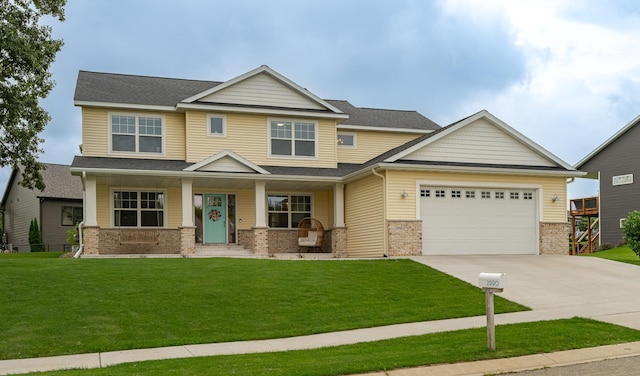 2990 Pinewood Ridge Dr SE, Rochester, MN 55904 - craftsman inspired home with driveway, a garage, a front yard, and a porch