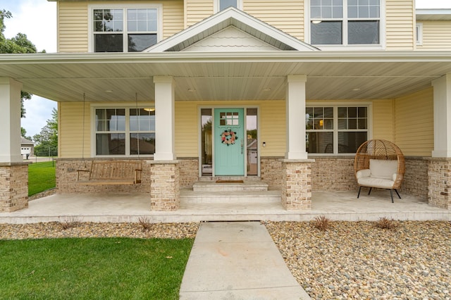 2990 Pinewood Ridge Dr SE, Rochester, MN 55904 - property entrance featuring a porch