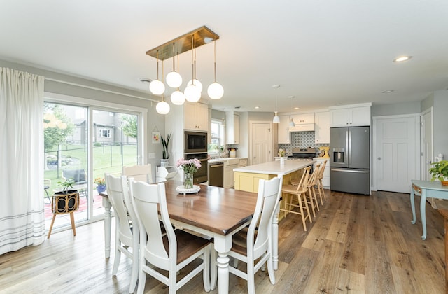 2990 Pinewood Ridge Dr SE, Rochester, MN 55904 - dining space featuring light wood-type flooring and recessed lighting