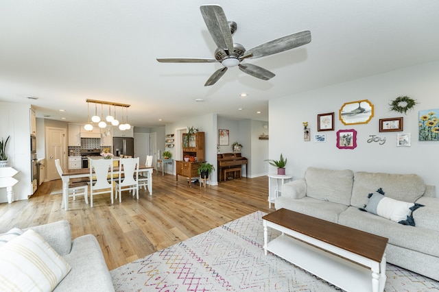 2990 Pinewood Ridge Dr SE, Rochester, MN 55904 - living room with a ceiling fan, light wood-type flooring, and recessed lighting