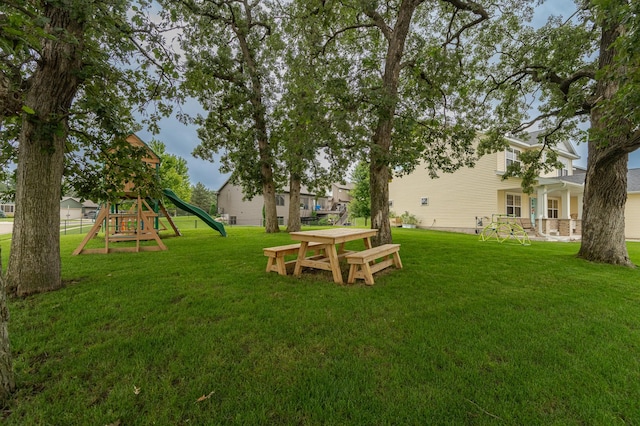2990 Pinewood Ridge Dr SE, Rochester, MN 55904 - view of grassy yard with a playground