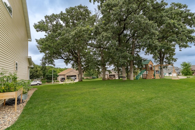 2990 Pinewood Ridge Dr SE, Rochester, MN 55904 - view of green lawn with a playground