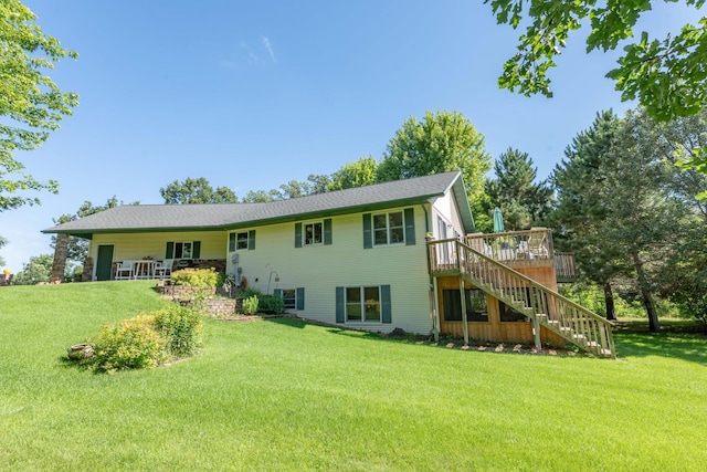 44198 Mosquito Trl, Pine Lake Twp, MN 56573 - back of property with stairs, a yard, and a deck