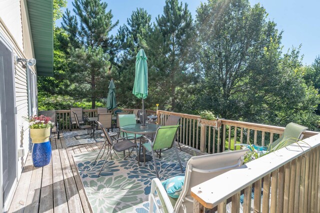 44198 Mosquito Trl, Pine Lake Twp, MN 56573 - wooden deck with outdoor dining area