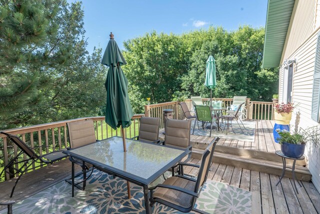 44198 Mosquito Trl, Pine Lake Twp, MN 56573 - wooden terrace featuring outdoor dining area