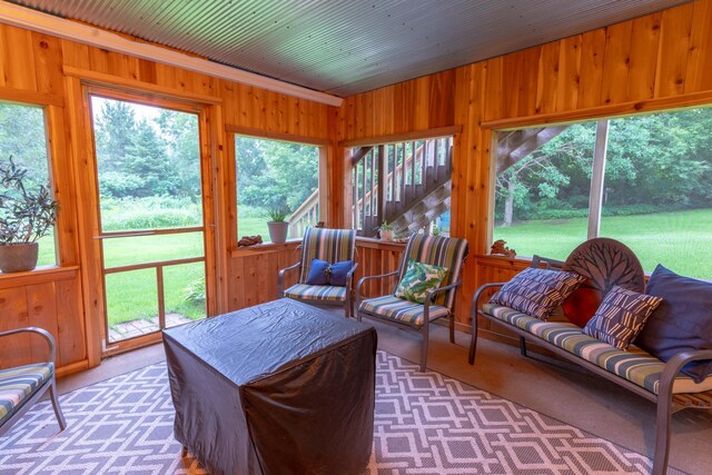 44198 Mosquito Trl, Pine Lake Twp, MN 56573 - sunroom / solarium featuring wooden walls, an outdoor living space, and vaulted ceiling