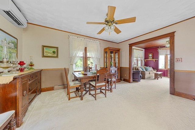 600 168th St, Summit Twp, MN 56026 - dining area with a wall unit AC, crown molding, a baseboard radiator, a ceiling fan, and light carpet