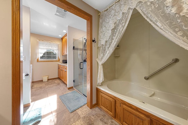 600 168th St, Summit Twp, MN 56026 - bathroom with a shower stall, a garden tub, and vanity
