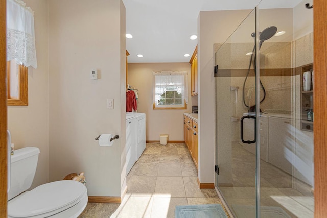 600 168th St, Summit Twp, MN 56026 - full bathroom featuring vanity, washing machine and clothes dryer, a stall shower, recessed lighting, and tile patterned floors