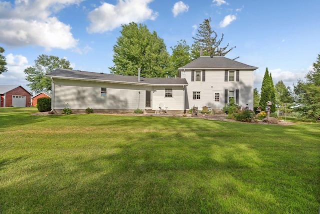 600 168th St, Summit Twp, MN 56026 - rear view of property featuring a yard and a patio area