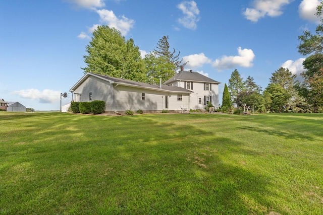 600 168th St, Summit Twp, MN 56026 - back of house featuring a yard