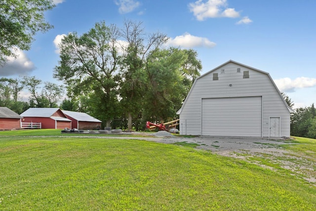 600 168th St, Summit Twp, MN 56026 - view of green lawn featuring a garage and an outdoor structure