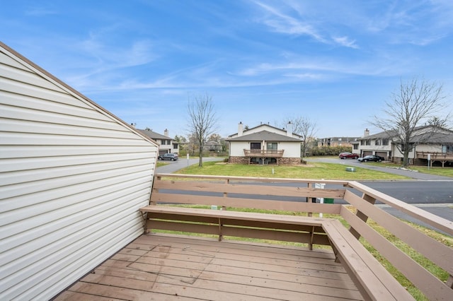 8431 Toledo Ave N, Brooklyn Park, MN 55443 - wooden terrace featuring a residential view and a lawn