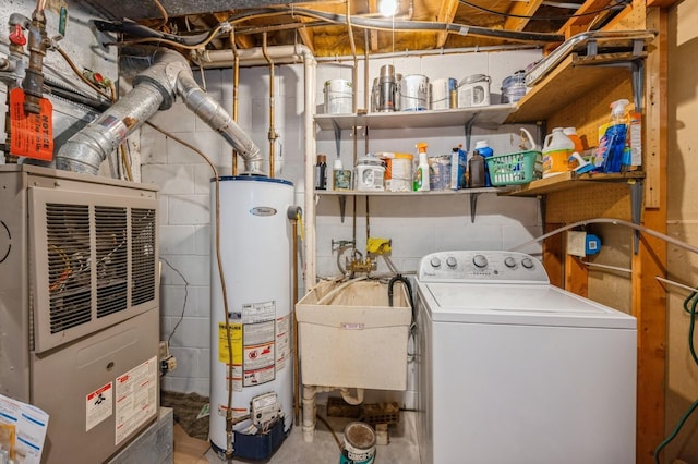 8431 Toledo Ave N, Brooklyn Park, MN 55443 - washroom with washer / dryer, gas water heater, and heating unit
