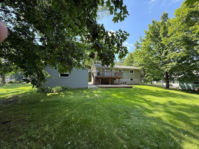925 Holcombe Ave, Litchfield, MN 55355 - view of grassy yard featuring a deck