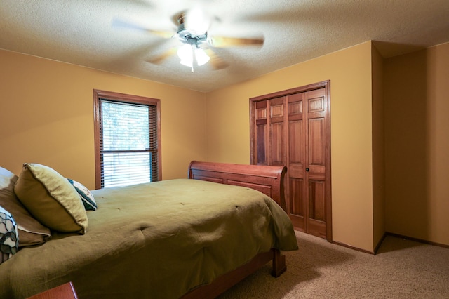 12310 Grouse St NW, Coon Rapids, MN 55448 - carpeted bedroom featuring a textured ceiling and ceiling fan