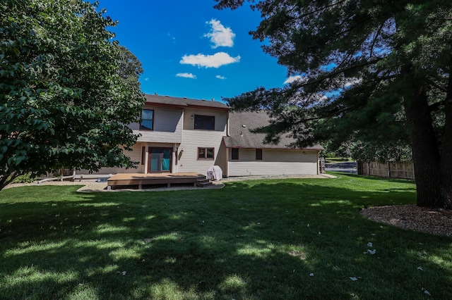 12310 Grouse St NW, Coon Rapids, MN 55448 - rear view of house with a wooden deck