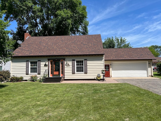 1010 Oakwood Ave, Benson, MN 56215 - view of front of property with asphalt driveway, a front yard, a chimney, a garage, and a shingled roof