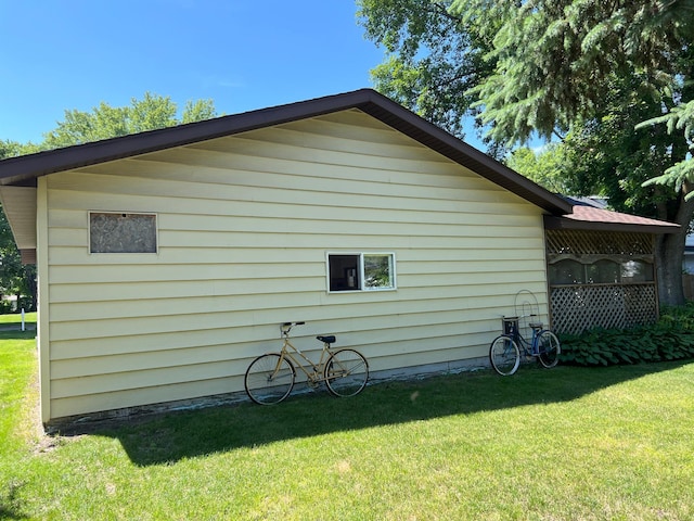 1010 Oakwood Ave, Benson, MN 56215 - view of home's exterior featuring a yard
