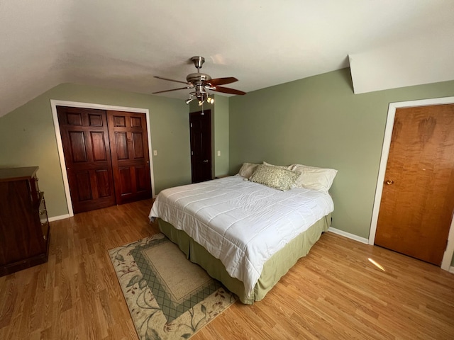 1010 Oakwood Ave, Benson, MN 56215 - bedroom with wood finished floors, lofted ceiling, a closet, and ceiling fan