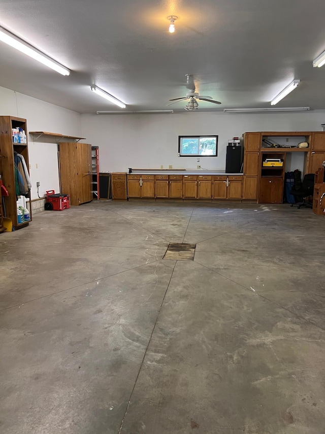 1010 Oakwood Ave, Benson, MN 56215 - garage with a ceiling fan
