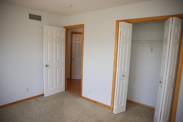 2690 Pinkspire Ln E, Maplewood, MN 55119 - unfurnished bedroom with carpet and a closet