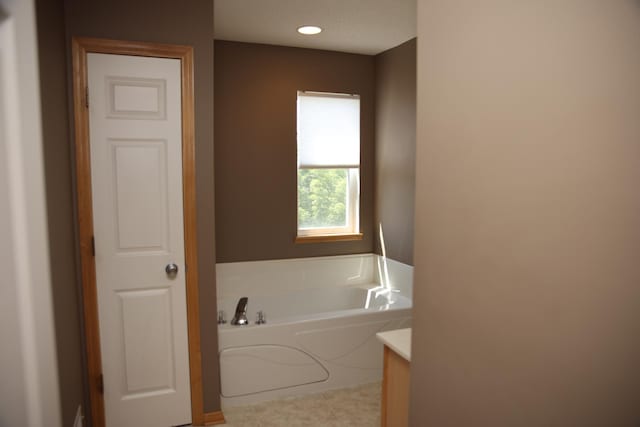 2690 Pinkspire Ln E, Maplewood, MN 55119 - full bath with a garden tub and vanity