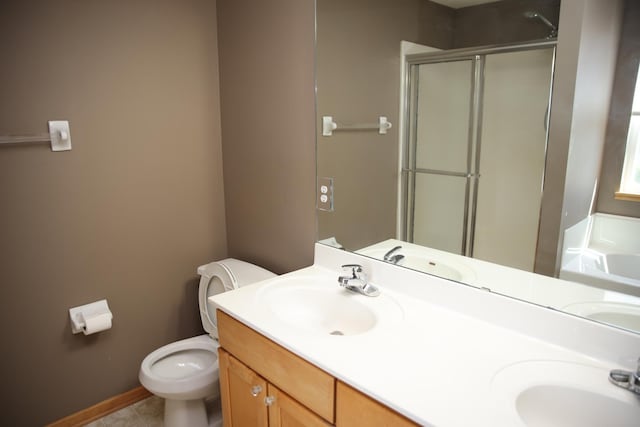 2690 Pinkspire Ln E, Maplewood, MN 55119 - bathroom with a shower stall, double vanity, and tile patterned flooring