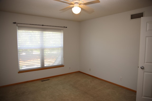 2690 Pinkspire Ln E, Maplewood, MN 55119 - unfurnished room featuring light carpet and a ceiling fan