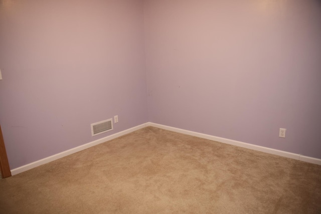 2690 Pinkspire Ln E, Maplewood, MN 55119 - carpeted spare room with baseboards