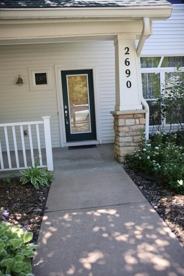 2690 Pinkspire Ln E, Maplewood, MN 55119 - property entrance with a porch