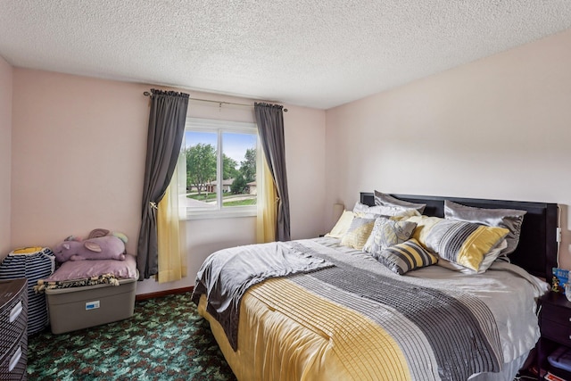9205 29th Ave N, New Hope, MN 55427 - carpeted bedroom with a textured ceiling