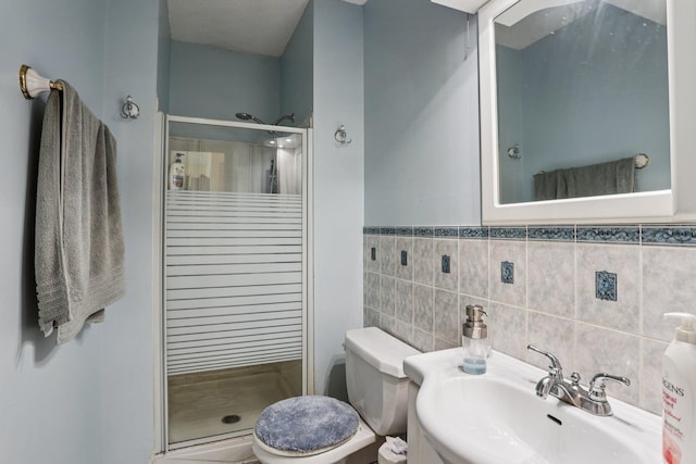 9205 29th Ave N, New Hope, MN 55427 - bathroom featuring a stall shower and tile walls
