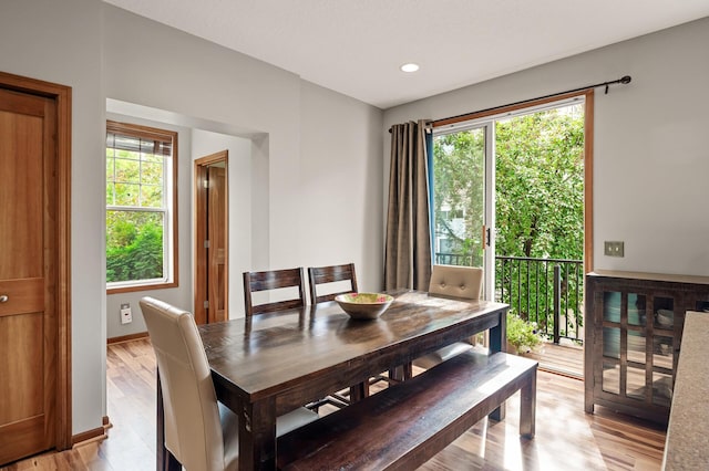 8291 Labont Way, Eden Prairie, MN 55344 - dining area with healthy amount of natural light, light wood finished floors, and recessed lighting