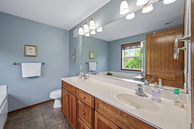 8291 Labont Way, Eden Prairie, MN 55344 - bathroom featuring double vanity, a bath, and stone finish flooring
