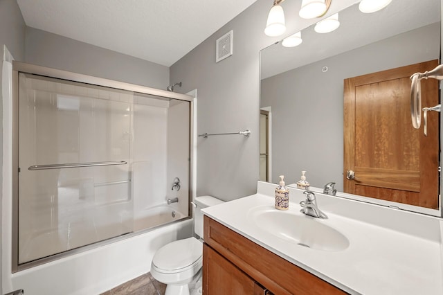 8291 Labont Way, Eden Prairie, MN 55344 - bathroom featuring vanity and combined bath / shower with glass door