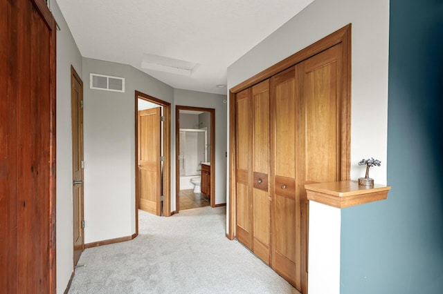 8291 Labont Way, Eden Prairie, MN 55344 - corridor featuring light colored carpet and attic access