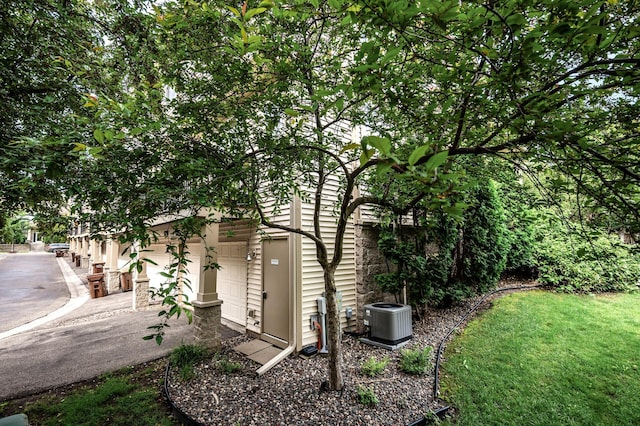 8291 Labont Way, Eden Prairie, MN 55344 - view of side of property featuring a central air condition unit