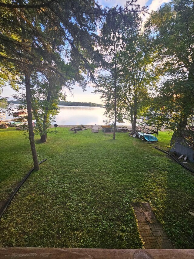 10285 237th Ave, Spirit Lake, IA 51360 - view of grassy yard with a water view